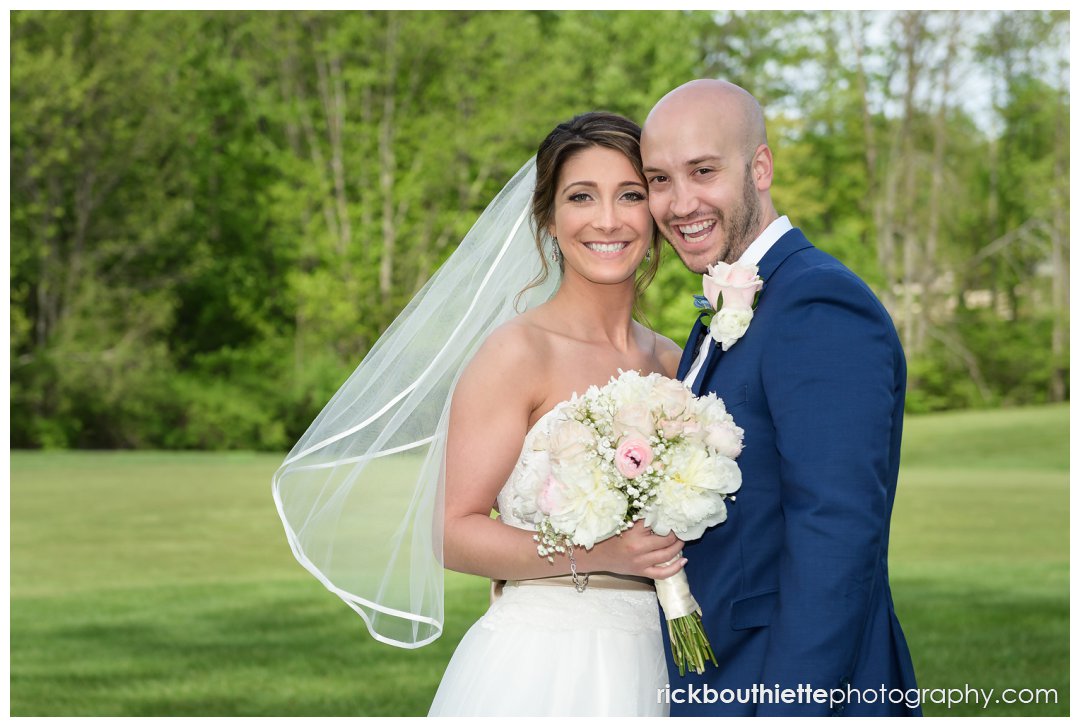 happy bride and groom at Candia Woods wedding in Southern NH