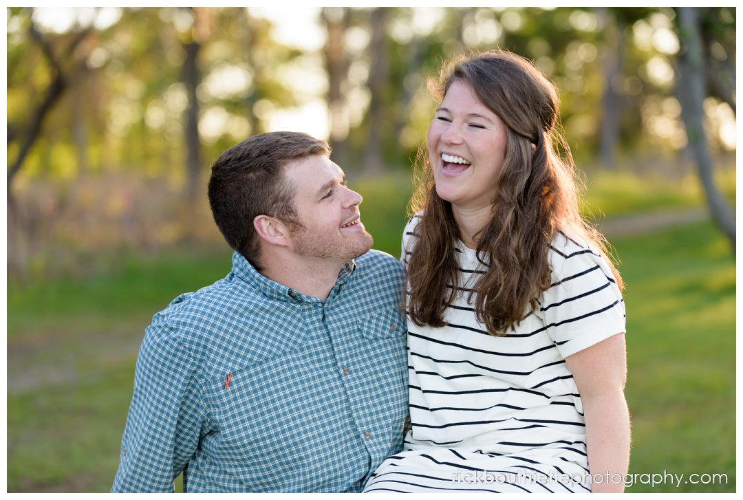 couple laughing during their fun seacoast engagement session