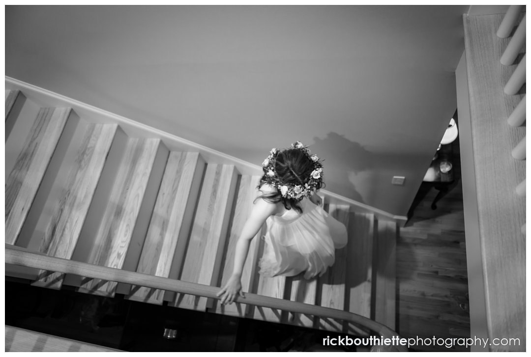 bride descending stairs on her way to her New Hampshire Seacoast Science Center wedding