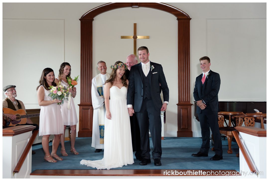 bride and groom introduced as Mr. & Mrs. after New Hampshire seacoast wedding