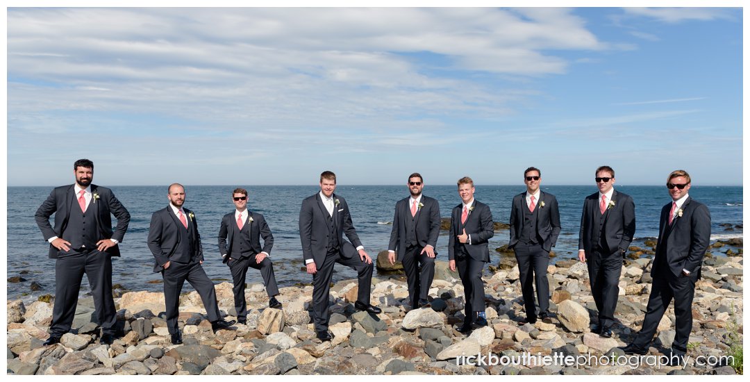 portrait if groom and groomsmen with ocean background at New Hampshire Seacoast Science Center wedding