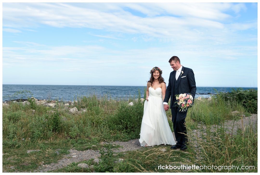bride and groom walking on path at New Hampshire Seacoast Science Center wedding