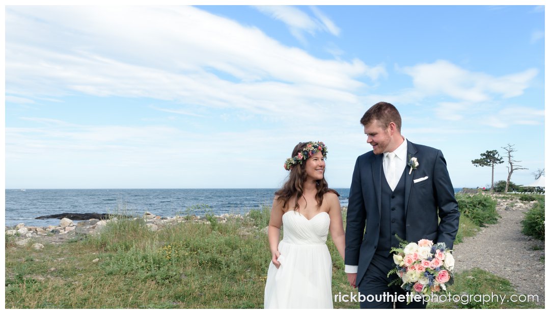 bride and groom share a casual walk at Seacoast Science Center wedding