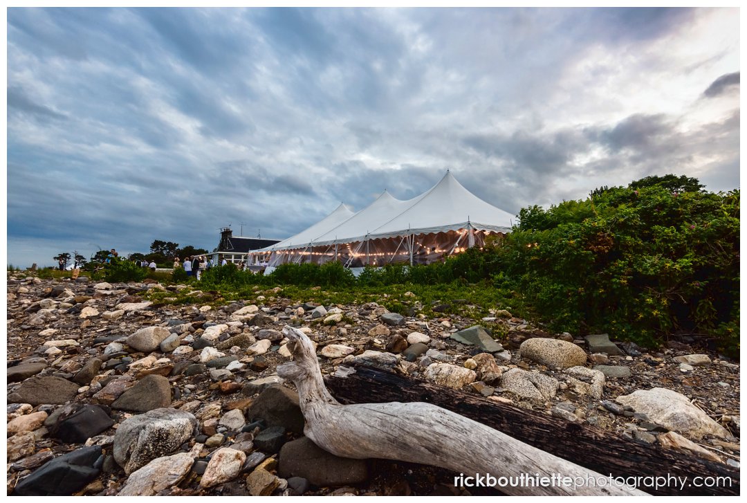 tent at dusk during Seacoast Science Center wedding reception