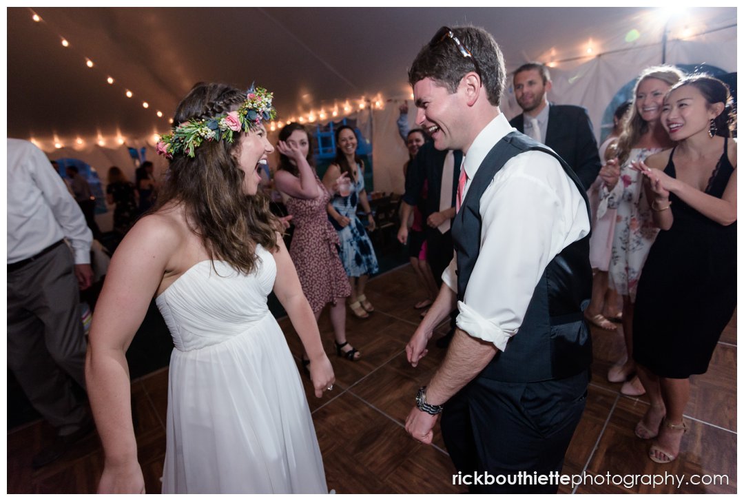 brother dances with bride at New Hampshire Seacoast Science Center wedding reception