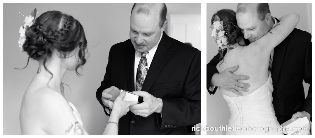 bride giving her father a gift before leaving for her wedding ceremony