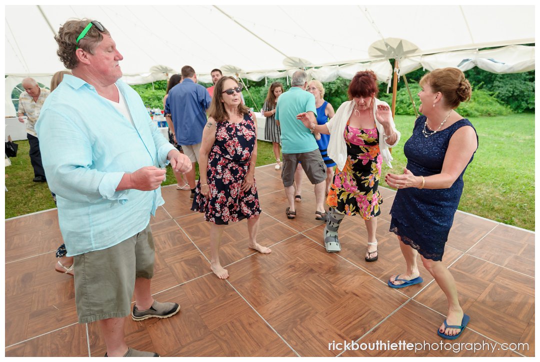 guests dancing at New Hampshire backyard summer wedding reception