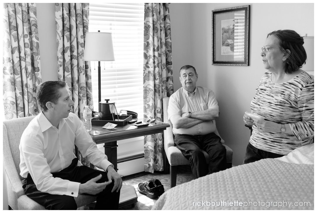 groom and his parents before Mountain View Grand Resort wedding ceremony