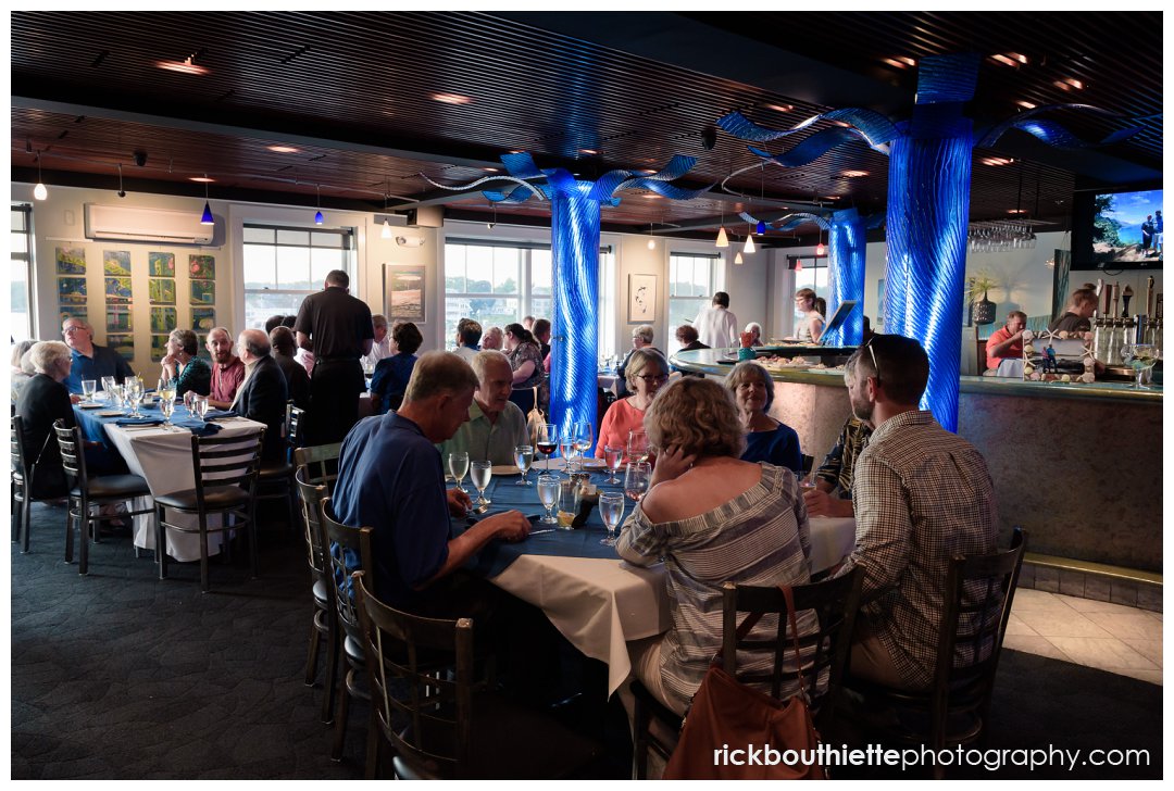 guests seated for dinner at wedding rehearsal dinner at Surf Room