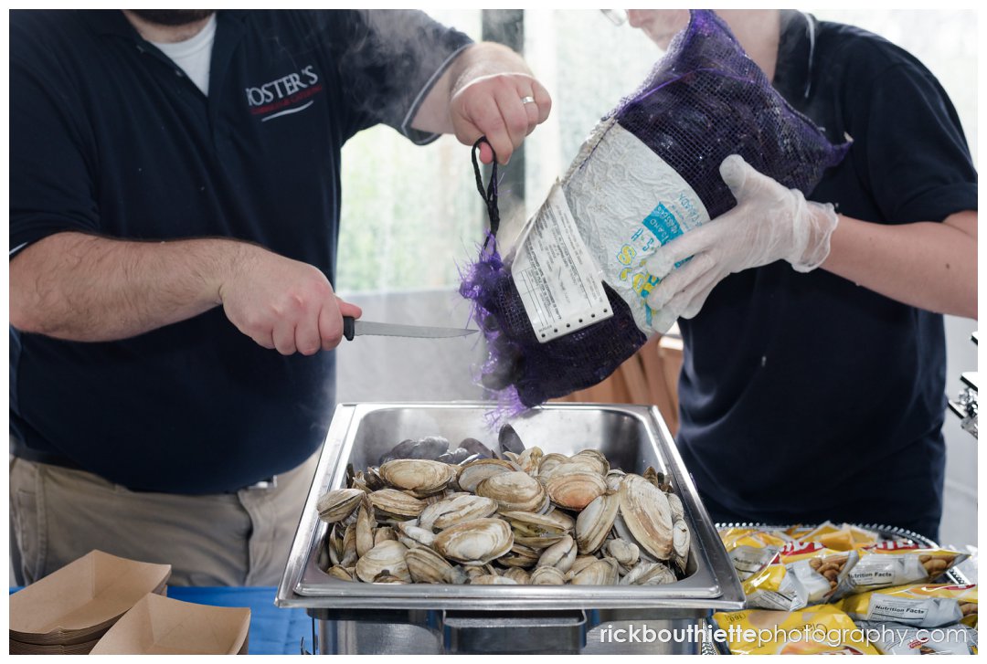 bag of steamed clams and mussels being prepared for Ordiorne Point Seacoast wedding reception