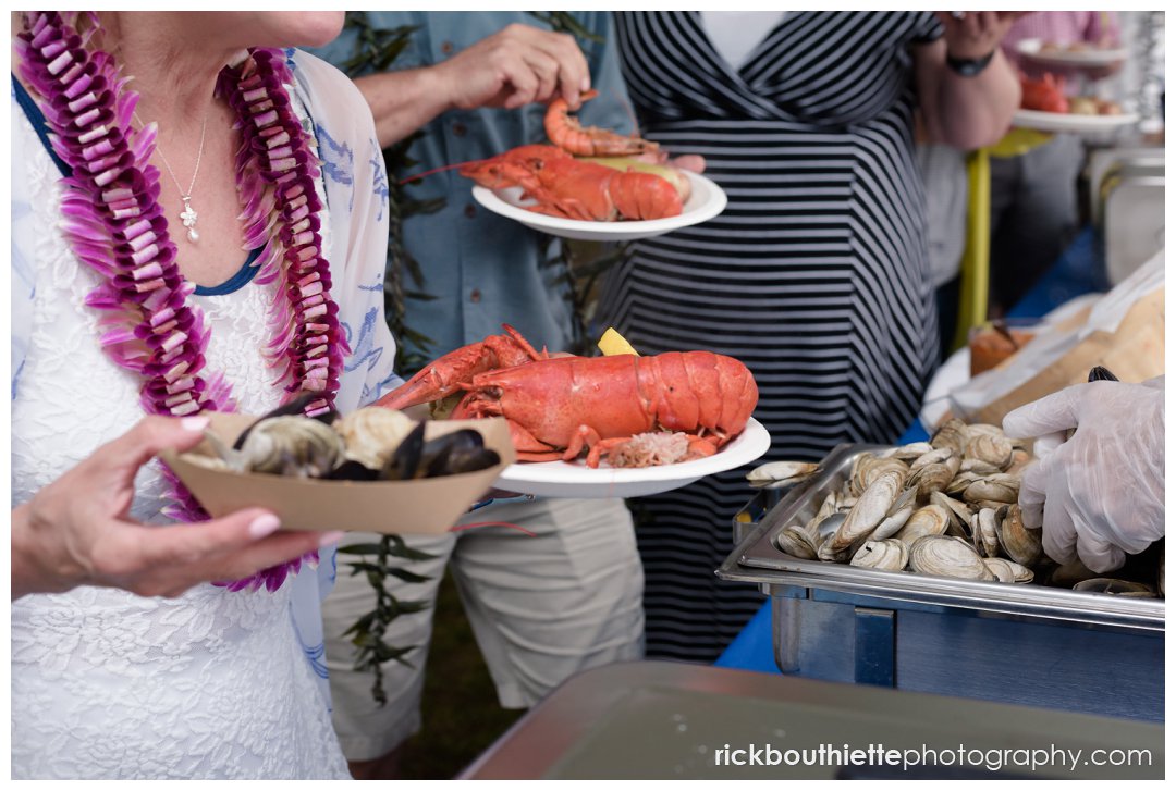 lobsters on guests plates at Ordiorne Point Seacoast wedding clambake