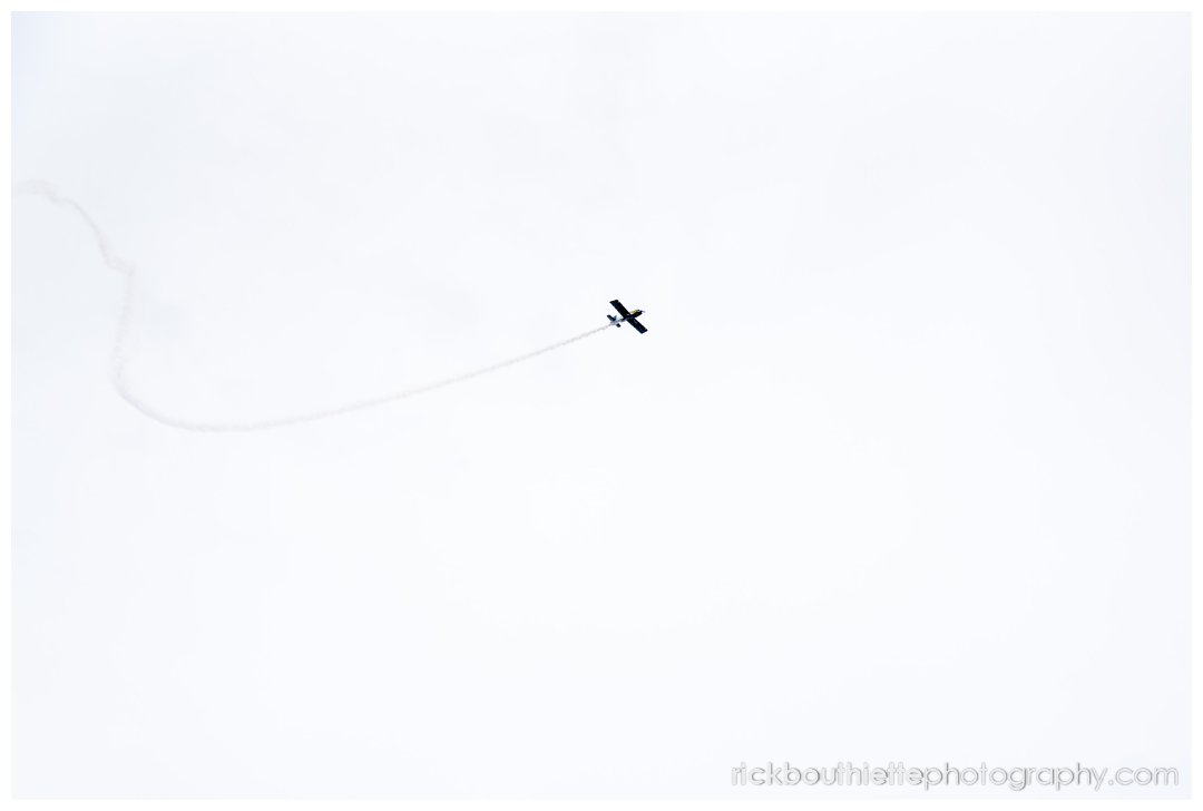stunt plane does a flyover for guests at Ordiorne Point Seacoast wedding reception