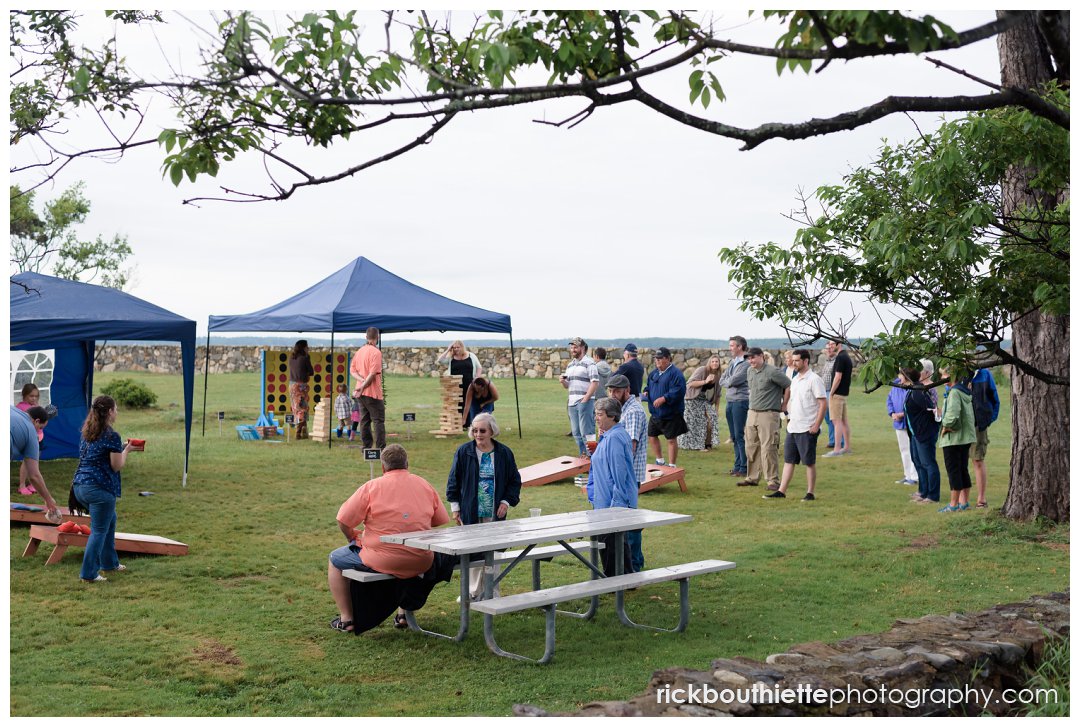 guests playing lawn games at Ordiorne Point Seacoast wedding reception 