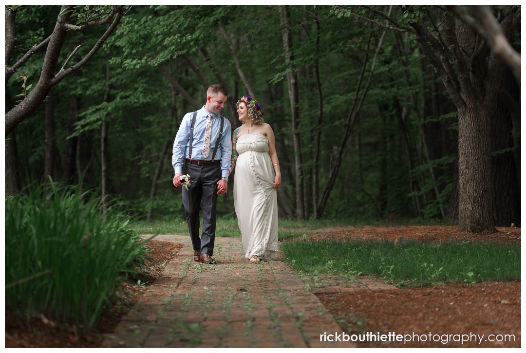 bride & groom walking at stonehedge hotel after lowell city hall wedding