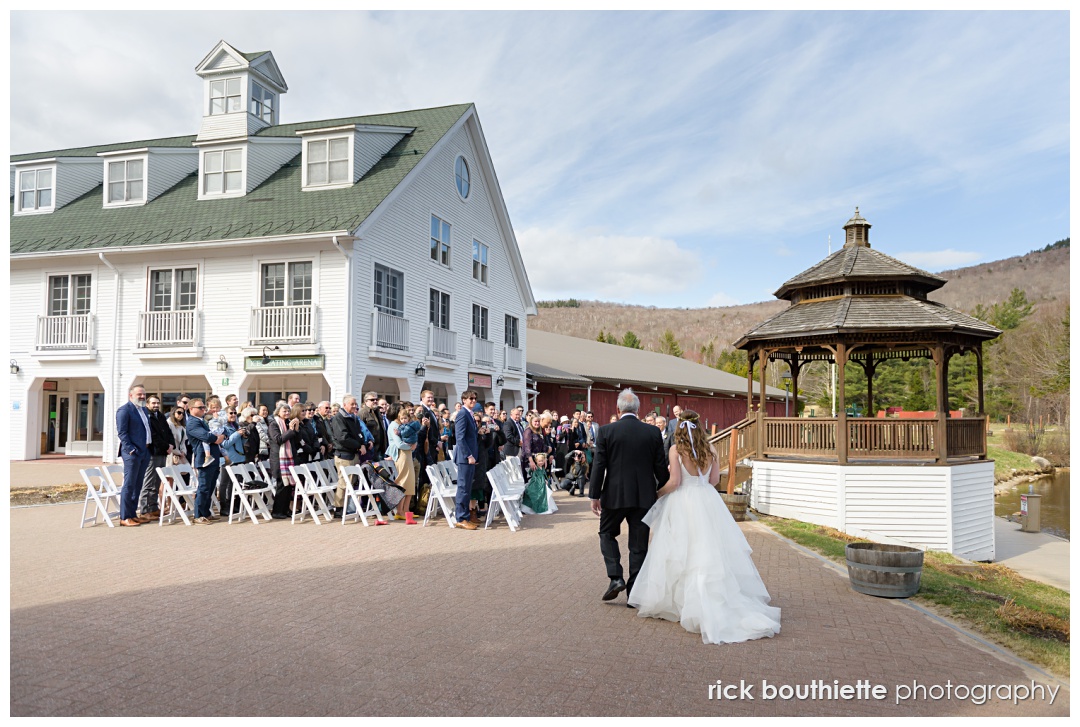 entering the gazebo ceremony site at Waterville Valley Resort dream wedding