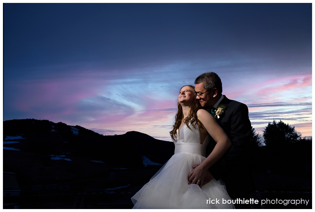 Sunset picture of bride and groom at their Waterville Valley Resort dream wedding